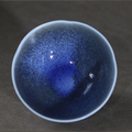 Jun Blue Kiln-Transformed Vintage Tea Bowl — side and top view showing deep indigo crystalline glaze